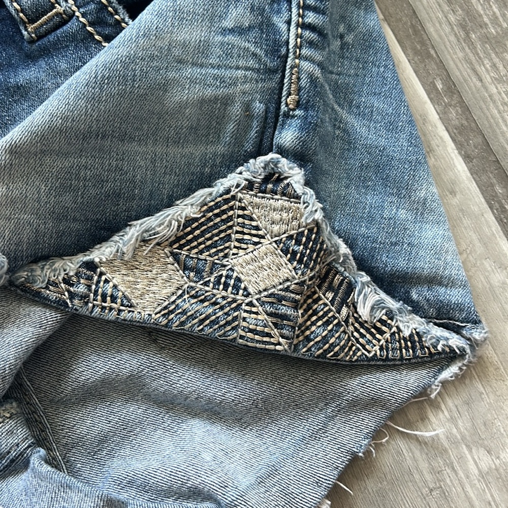 Miss Me Blue Denim Distressed Shorts with Snake Print Trim - Picture 9 of 13